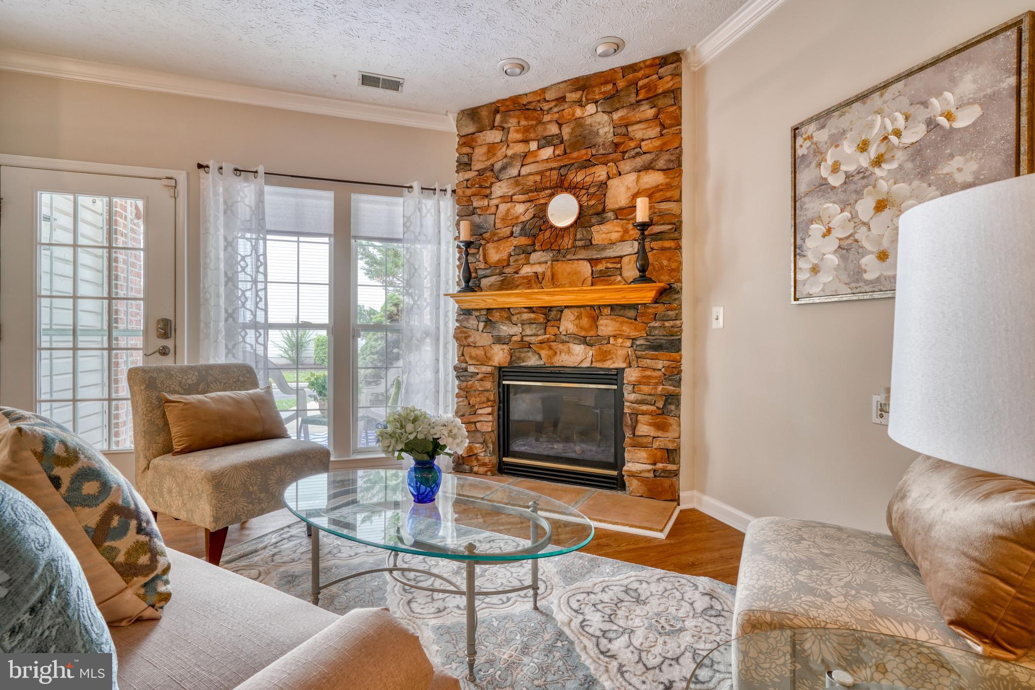 5174 Brightleaf Court, Unit 5174 Rosedale, MD 21237 - Photo 6 of 26 Gas Fireplace with beautiful stone