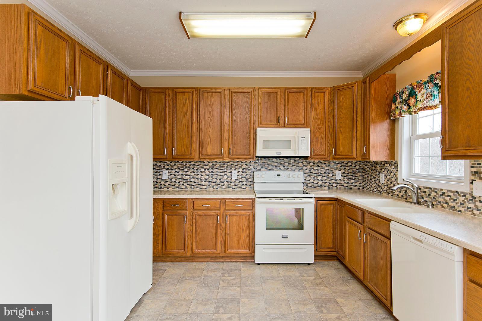 1434 Canterbury Road Front Royal, VA 22630 - Photo 12 of 57 Kitchen has been updated counter top,back splash