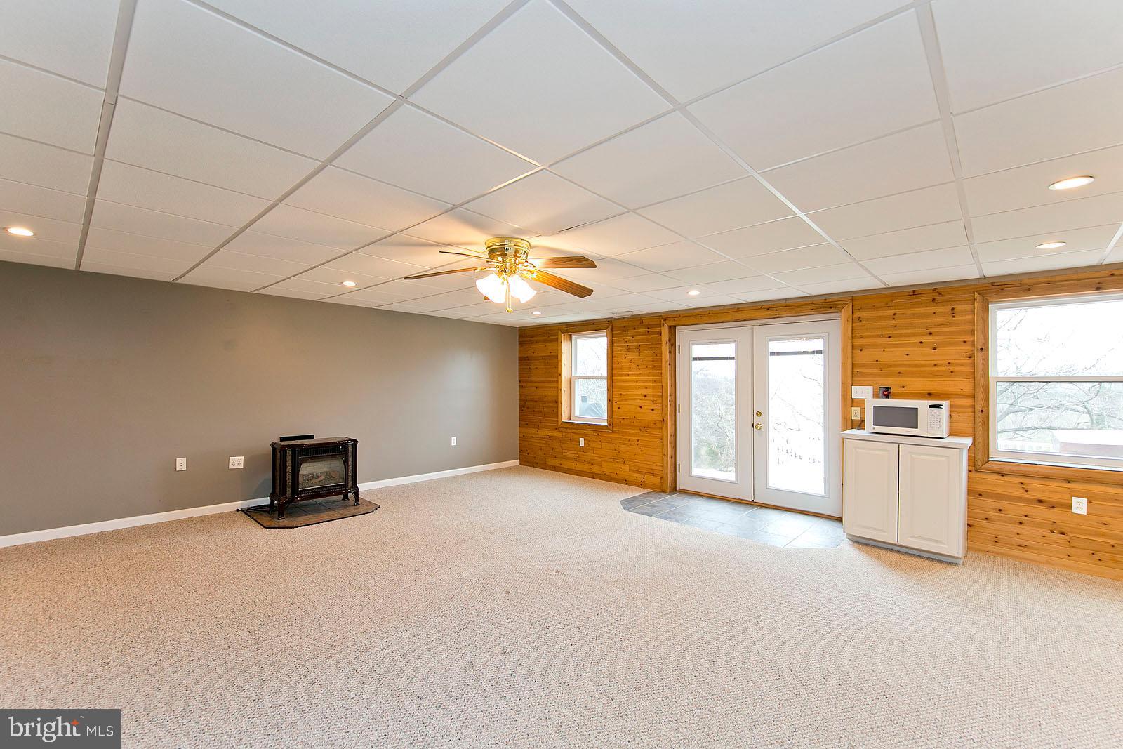 1434 Canterbury Road Front Royal, VA 22630 - Photo 33 of 57 Rec room / Family rm in basement; LP stove conveys