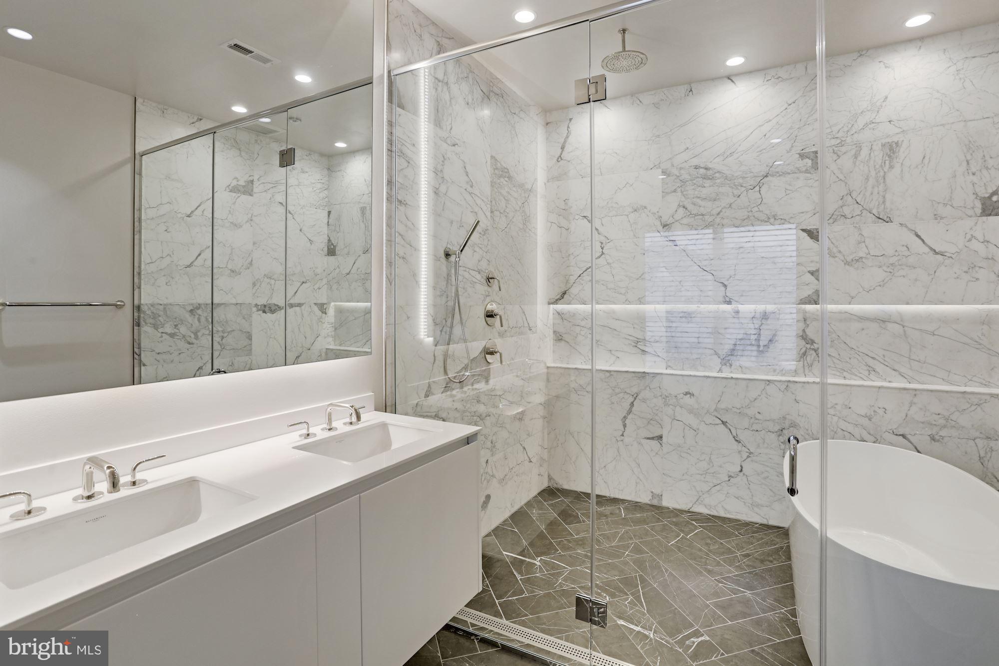 424 C Street Northeast Washington, DC 20002 - Photo 17 of 26 a bathroom with a bathtub and a sink