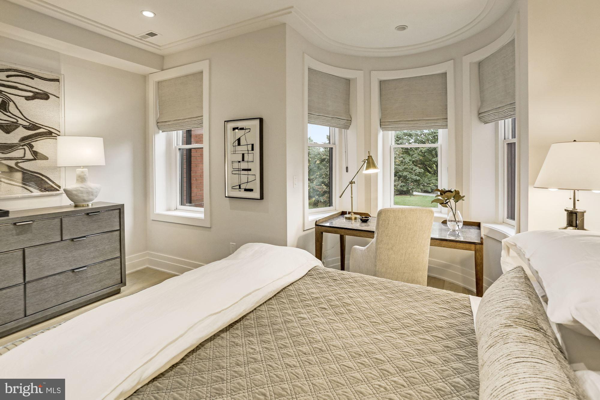 424 C Street Northeast Washington, DC 20002 - Photo 23 of 26 a bedroom with a bed and wooden floor
