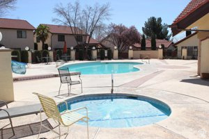301 South 1200th Street East, Unit 31 St. George, UT 84790 - Photo 21 of 21 Community pool with a patio area and a hot tub