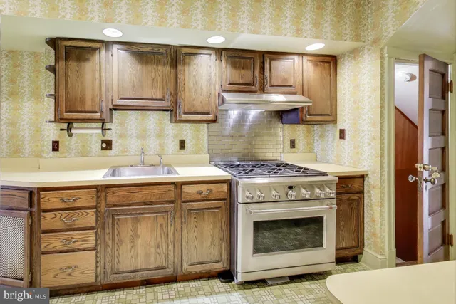a bed sitting in front of a window