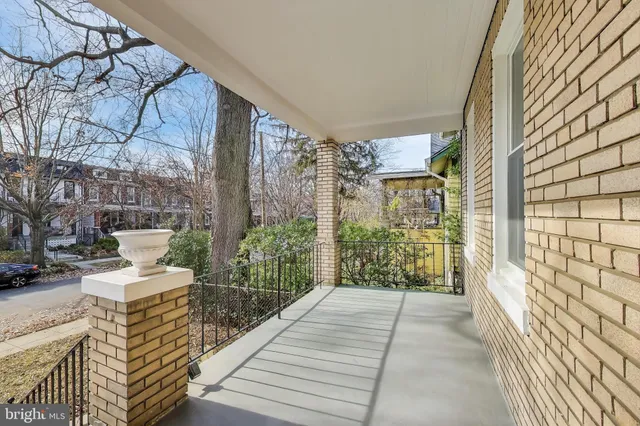 a view of a balcony with city view