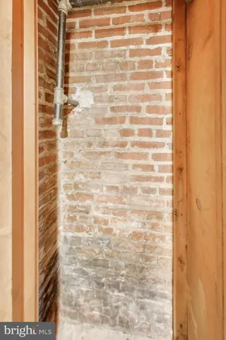 a picture of a bathroom with a shower