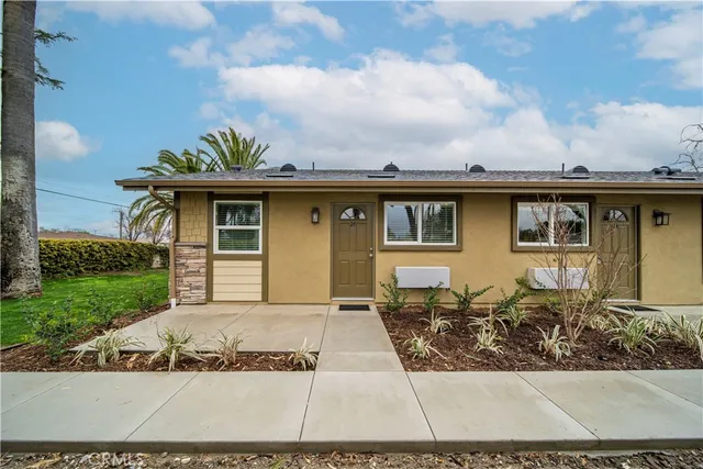 front view of house with a yard