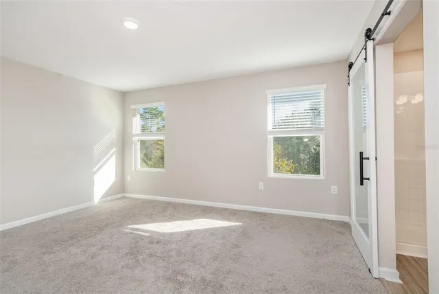 an empty room with windows