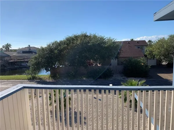 a view of street from balcony