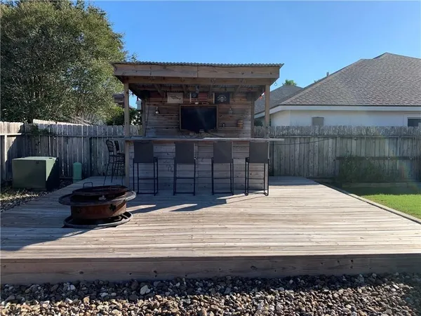 a view of a terrace with a bench