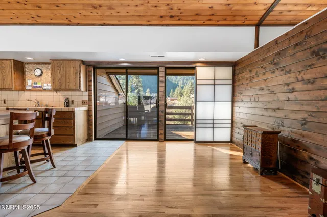 a view of outdoor space with seating and slides