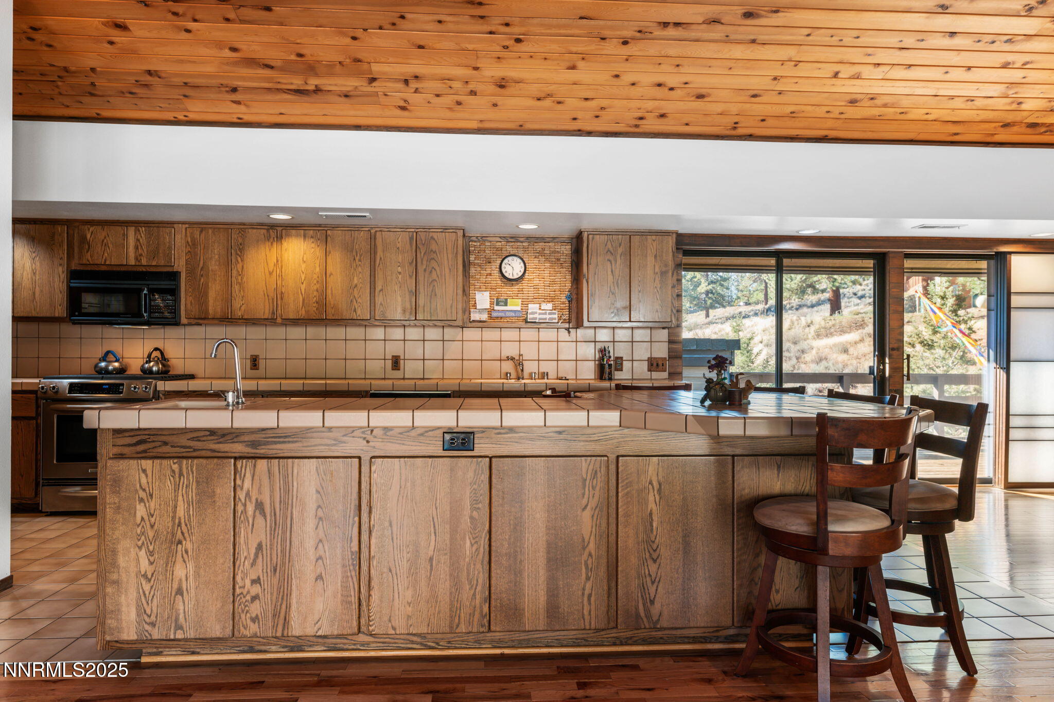 4650 Old Clear Creek Road Carson City, NV 89705 - Photo 27 of 59 a kitchen with a sink and cabinets