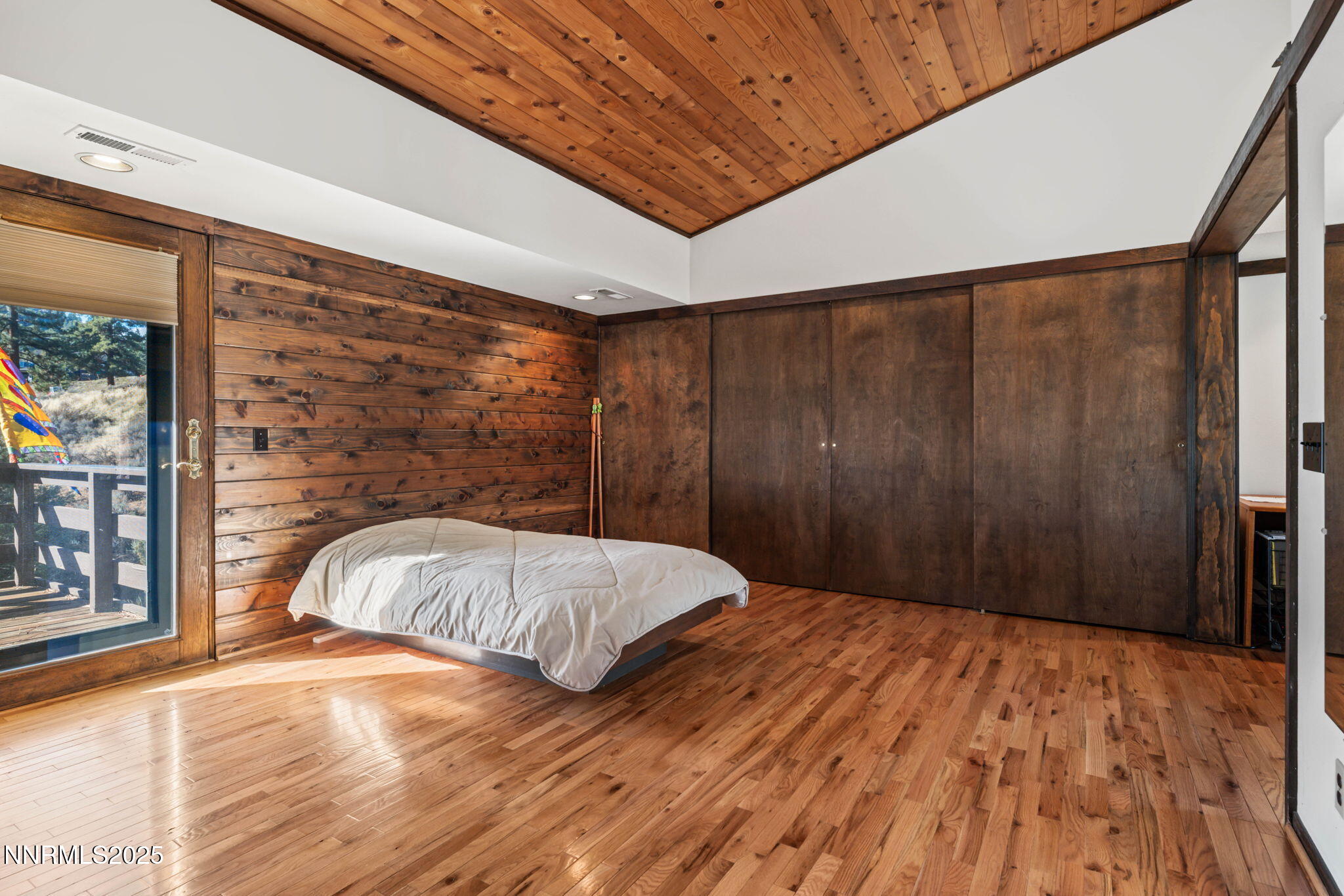 4650 Old Clear Creek Road Carson City, NV 89705 - Photo 30 of 59 a bed sitting in a spacious bedroom next to a window