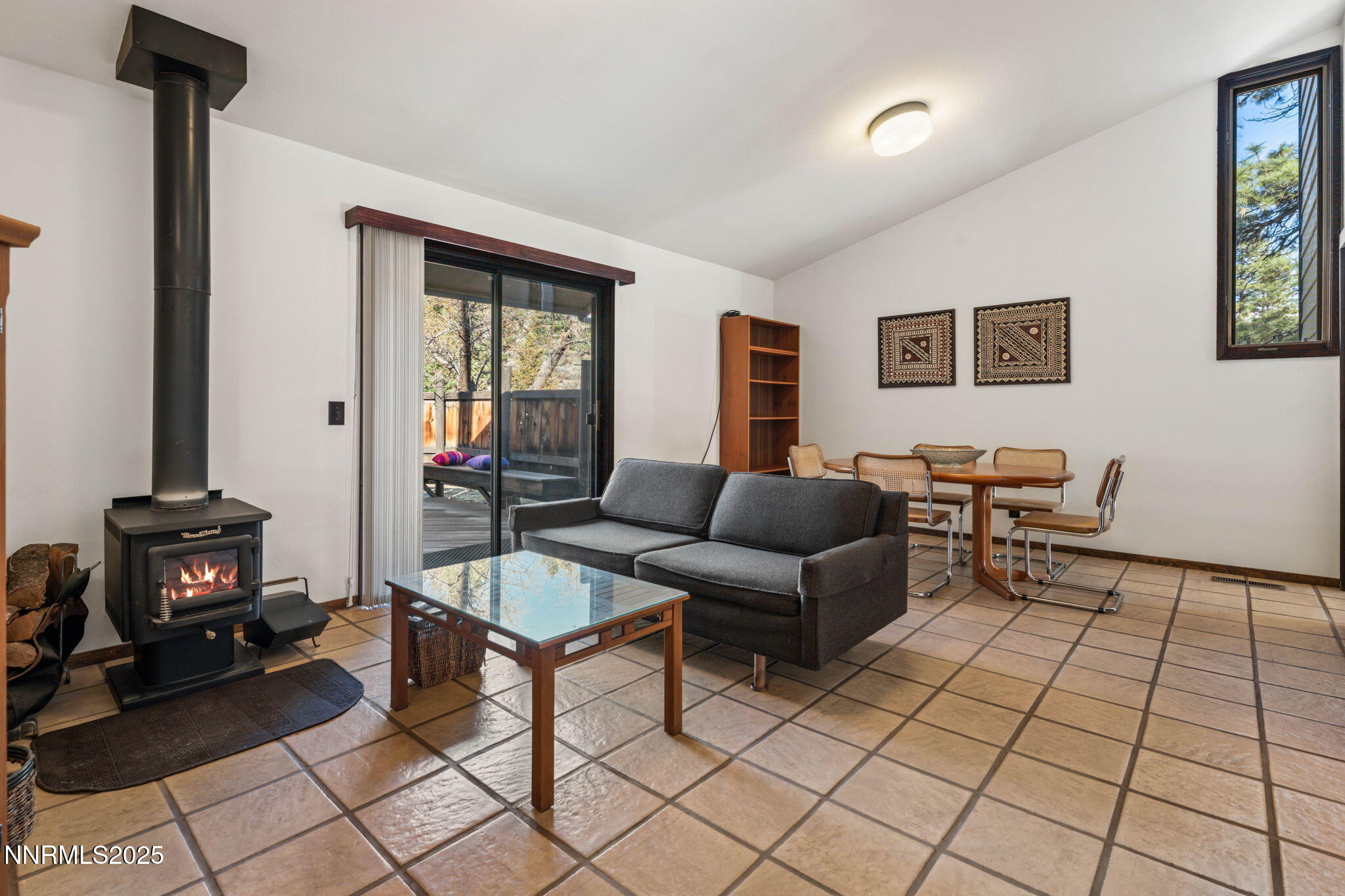 4650 Old Clear Creek Road Carson City, NV 89705 - Photo 36 of 59 a living room with furniture and a fireplace