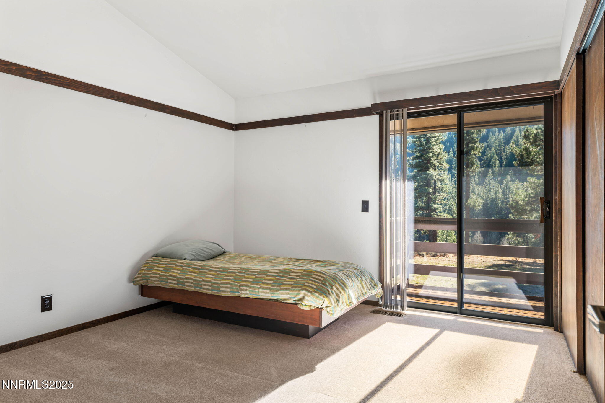 4650 Old Clear Creek Road Carson City, NV 89705 - Photo 42 of 59 a bedroom with a bed and a window