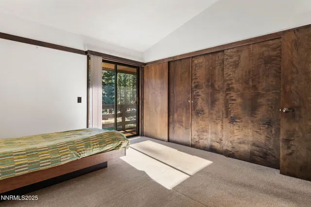 a bathroom with a sink a mirror and a toilet