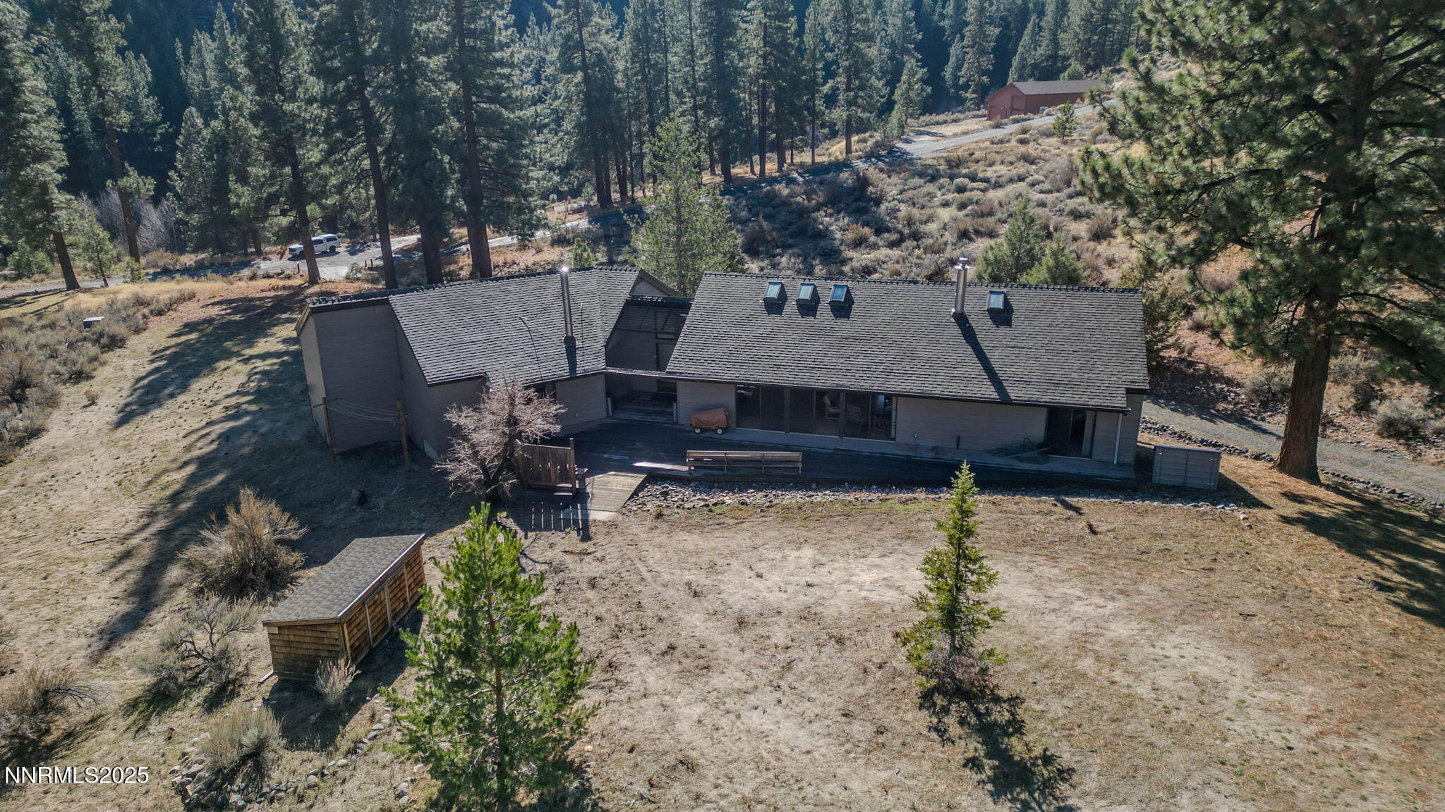 4650 Old Clear Creek Road Carson City, NV 89705 - Photo 51 of 59 an aerial view of a house with yard and sitting area