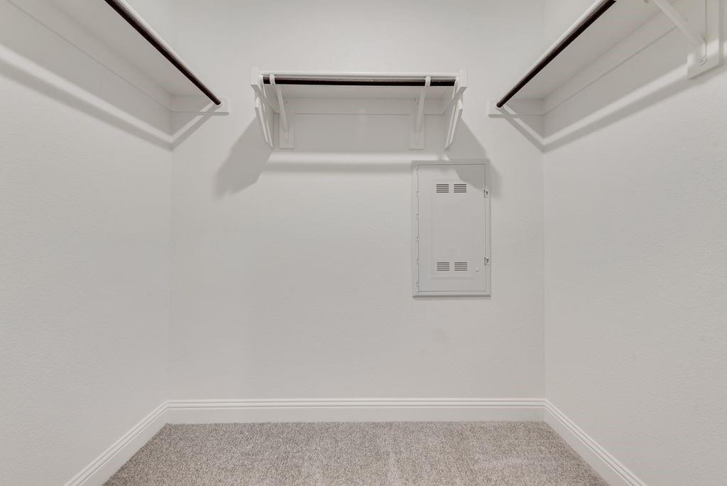 8159 Challenger Lane Frisco, TX 75034 - Photo 14 of 36 a view of walk in closet