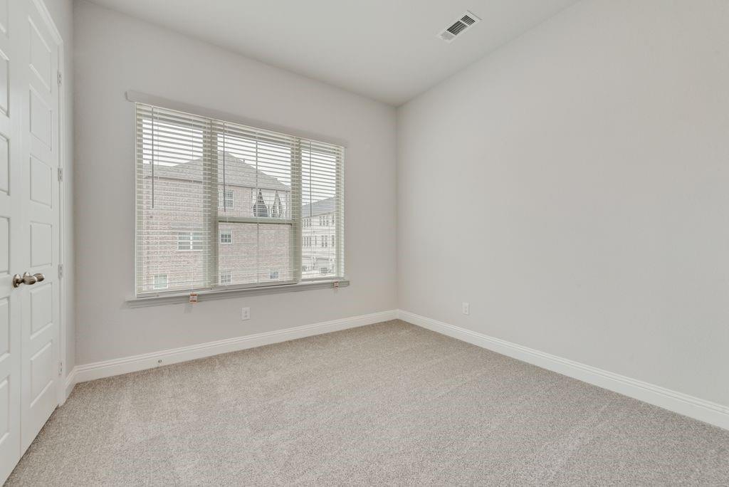 8159 Challenger Lane Frisco, TX 75034 - Photo 23 of 36 an empty room with a window