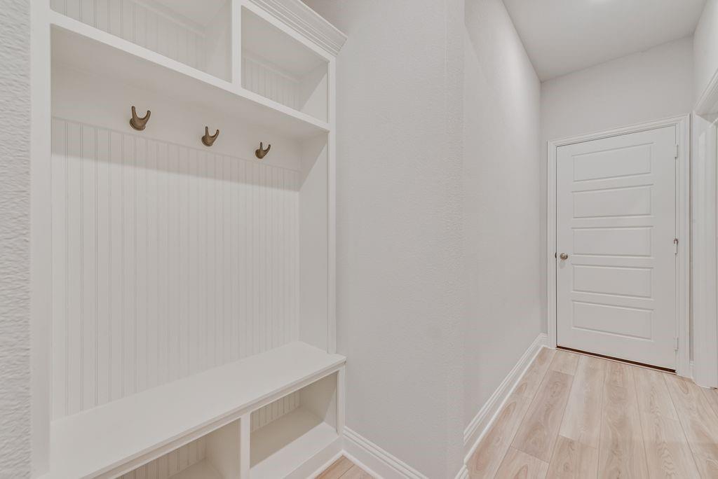 8159 Challenger Lane Frisco, TX 75034 - Photo 28 of 36 a view of an empty walk in closet