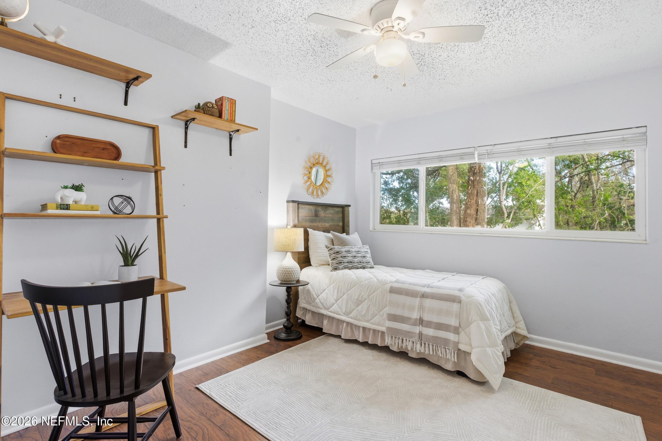 6231 Riviera Manor Drive Jacksonville, FL 32216 - Photo 21 of 33 a bedroom with a bed and a window