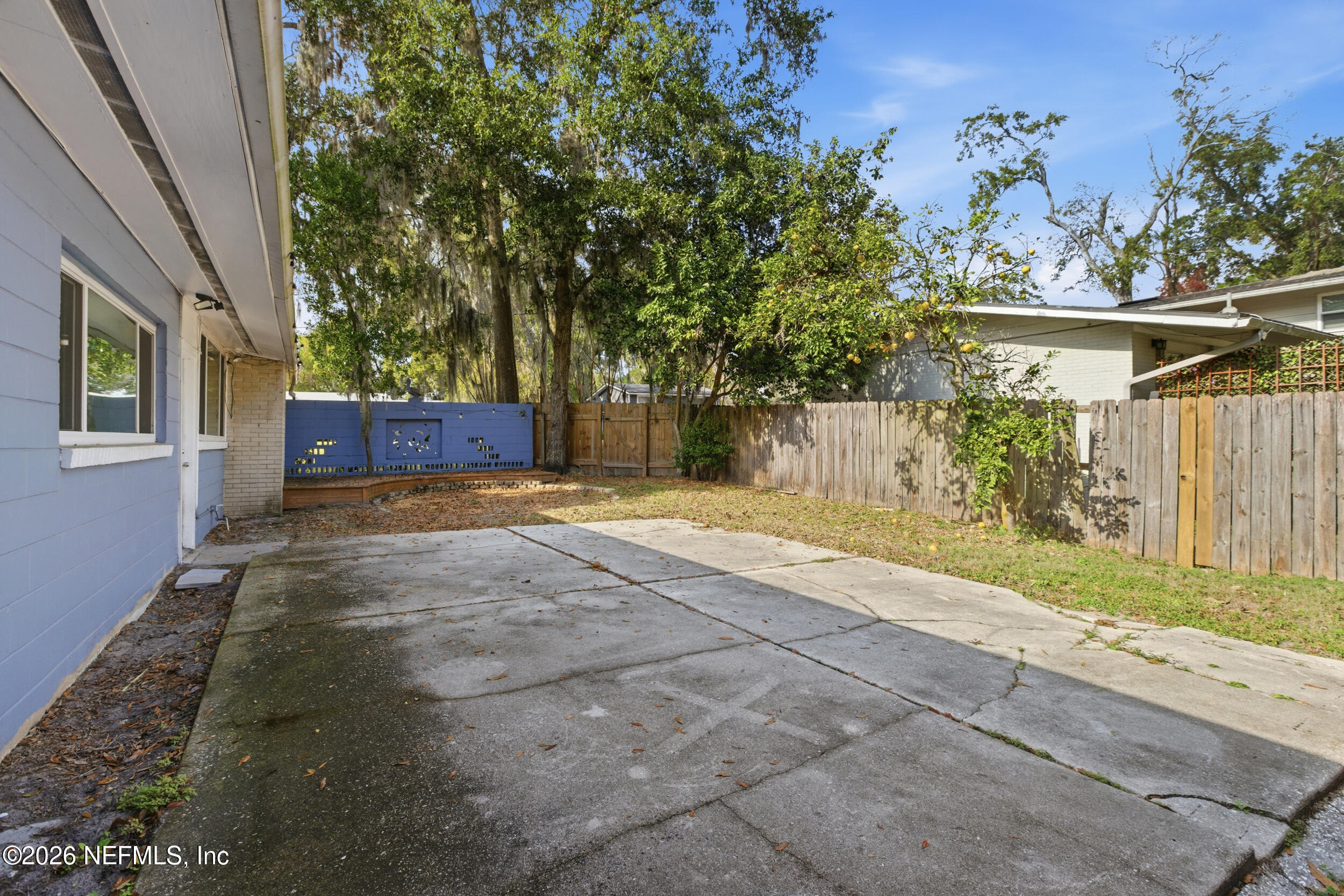 6231 Riviera Manor Drive Jacksonville, FL 32216 - Photo 26 of 33 front view of a house with a yard