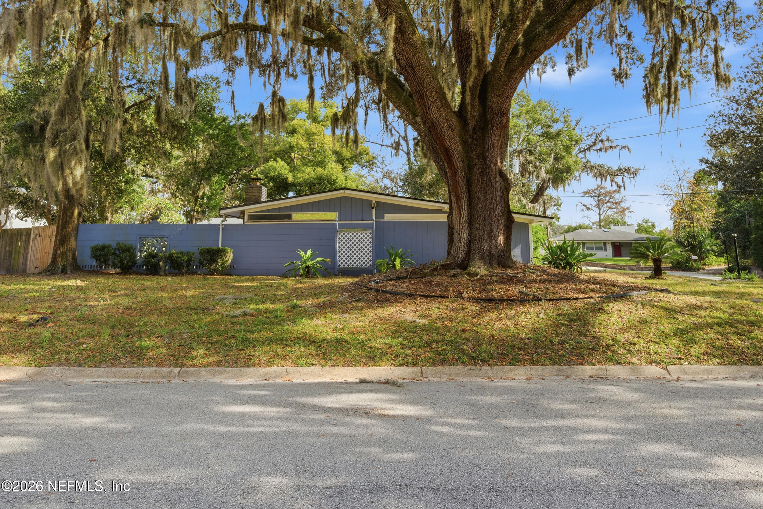6231 Riviera Manor Drive Jacksonville, FL 32216 - Photo 27 of 33 a view of a house with a yard