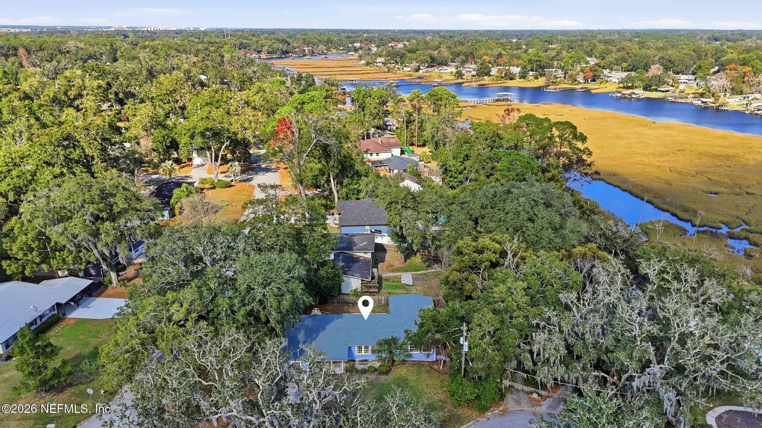 6231 Riviera Manor Drive Jacksonville, FL 32216 - Photo 30 of 33 an aerial view of residential houses with outdoor space and river