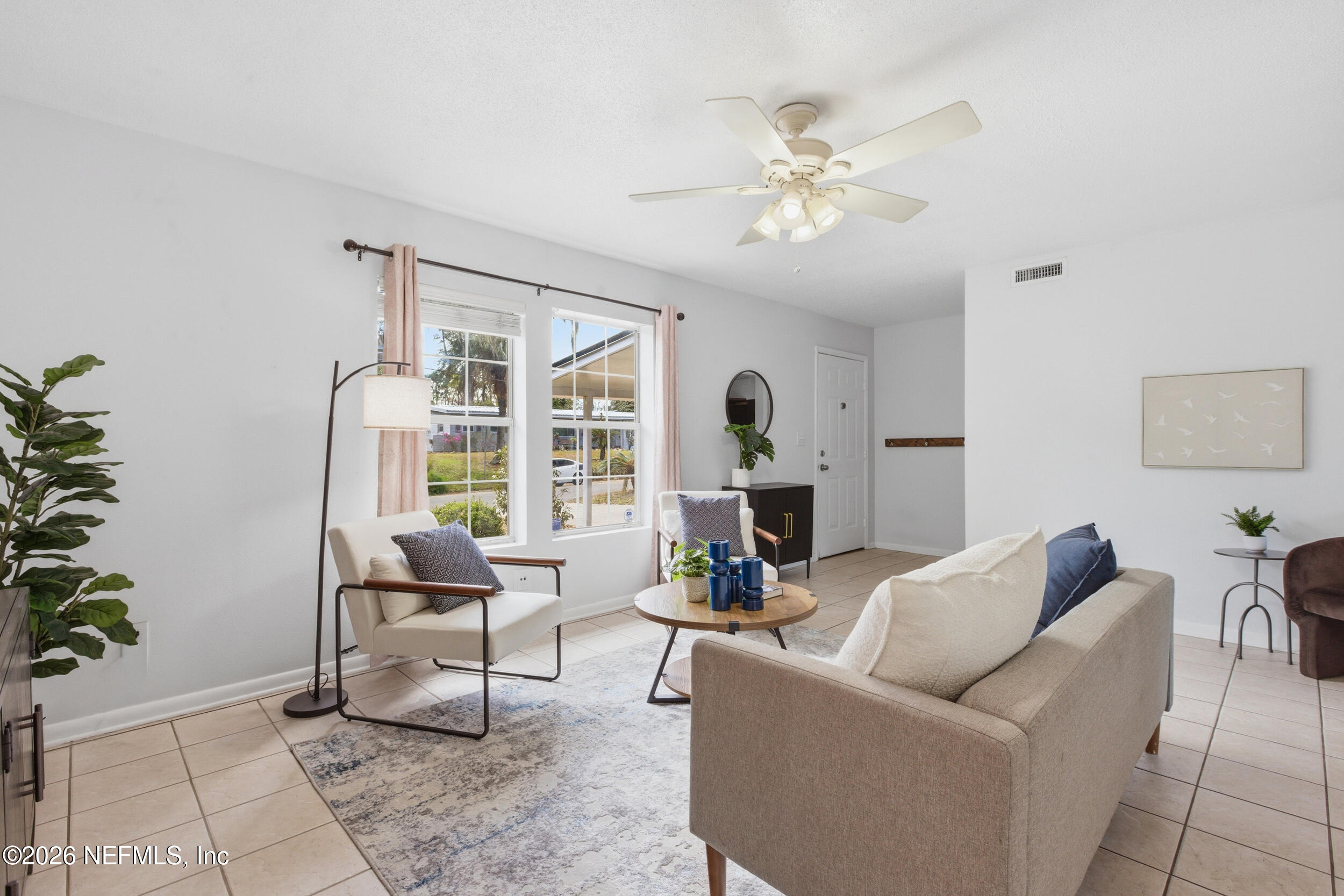 6231 Riviera Manor Drive Jacksonville, FL 32216 - Photo 4 of 33 a living room with furniture and white walls