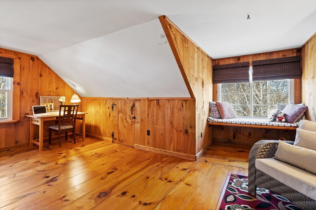 16 Main Street, Unit 3 Pepperell, MA 01463 - Photo 24 of 30 a living room with furniture and a large window