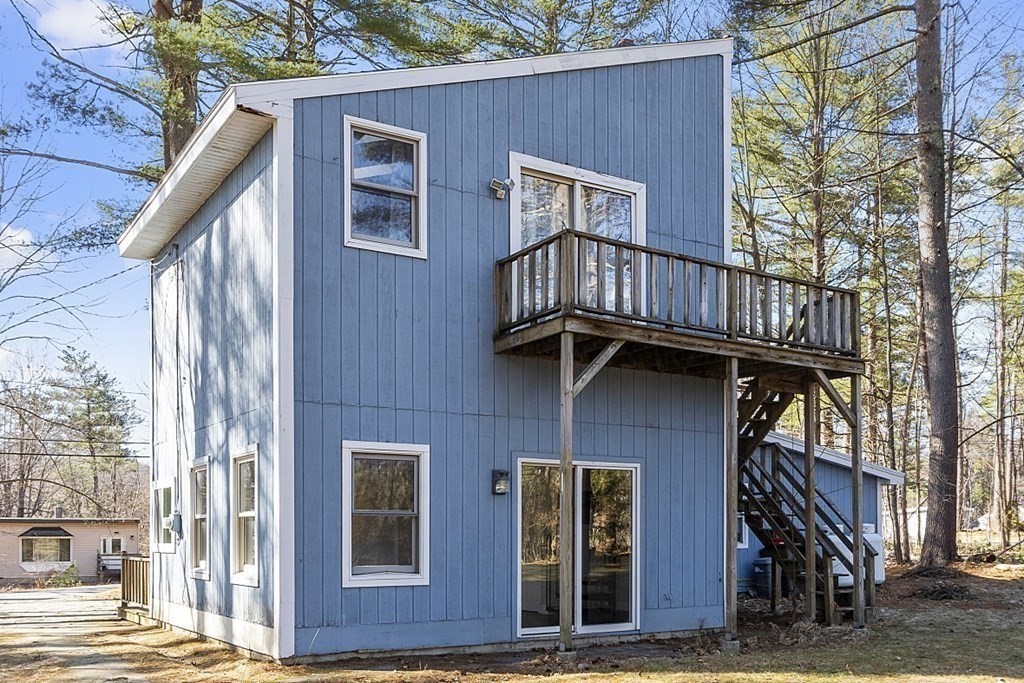 126 South Row Road Lunenburg, MA 01462 - Photo 23 of 28 a front view of a house with balcony