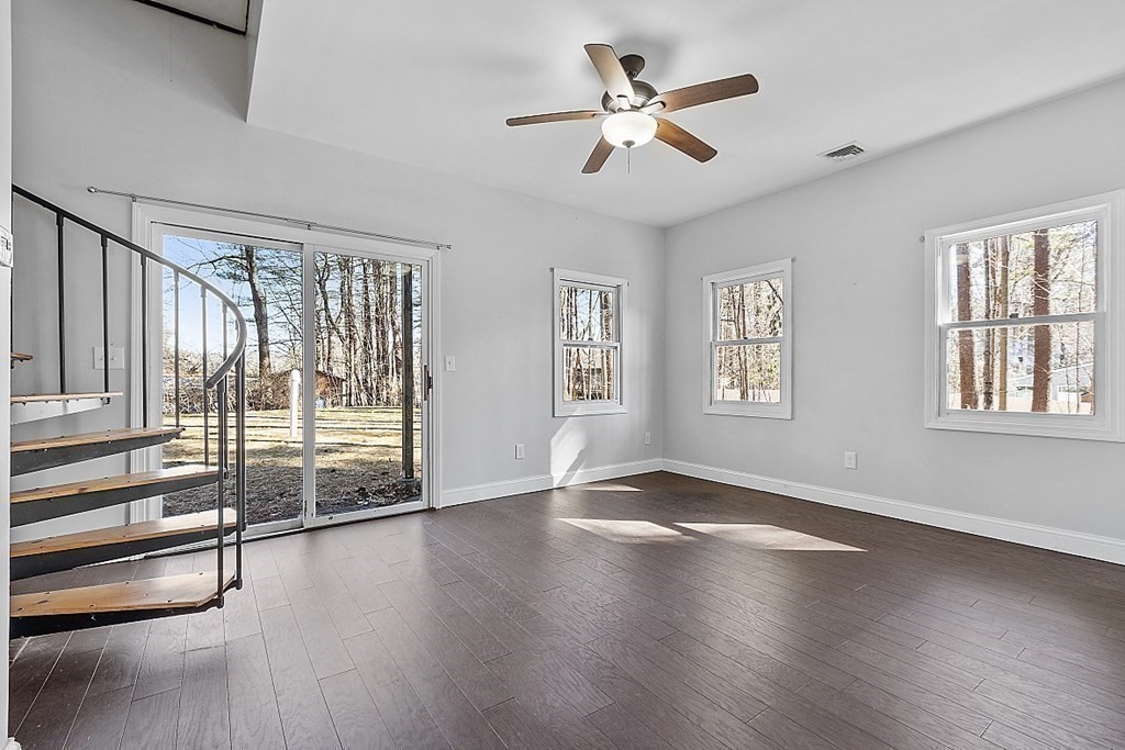 126 South Row Road Lunenburg, MA 01462 - Photo 10 of 28 wooden floor in an empty room with a window