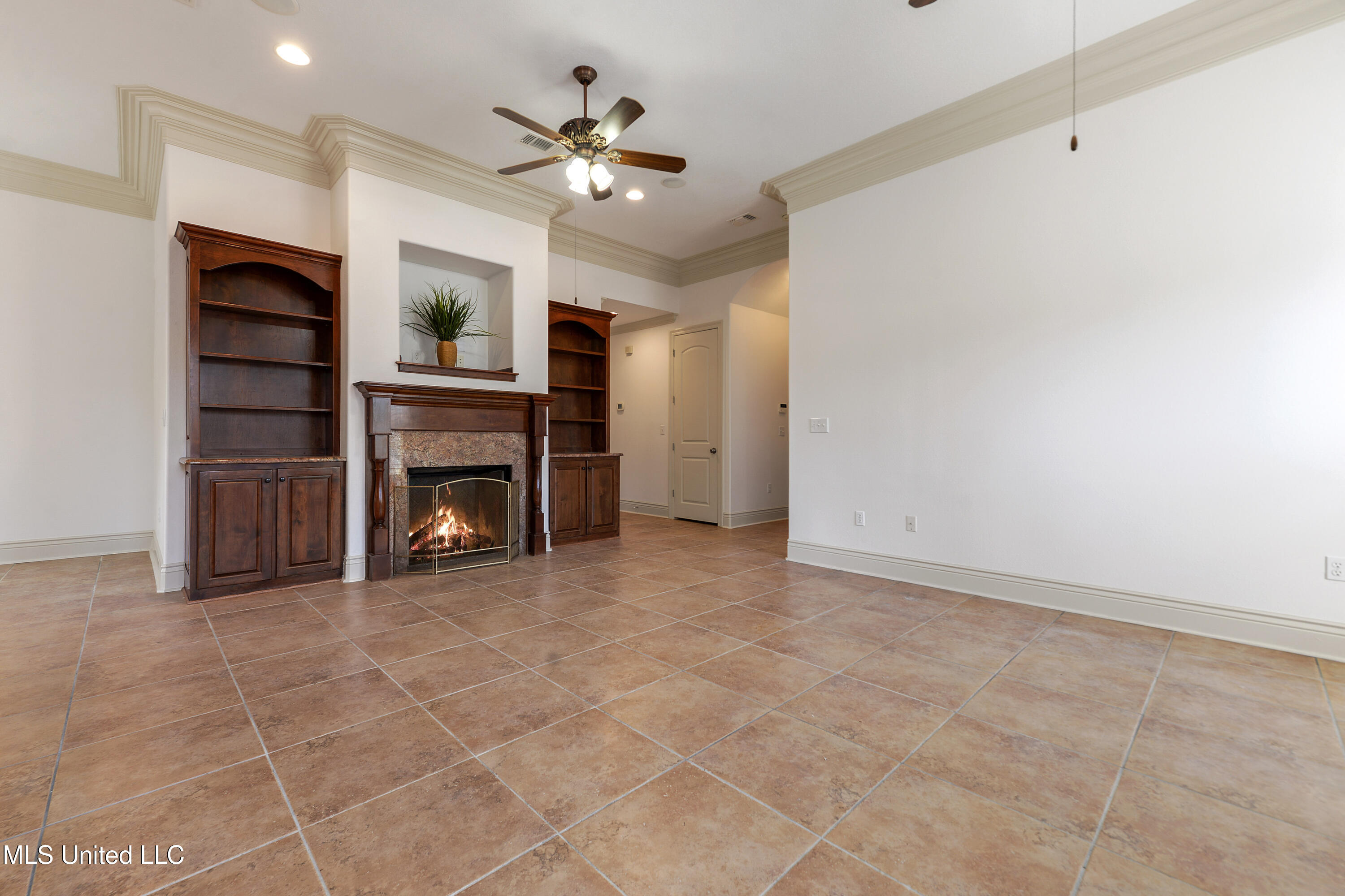 4 Rue Orleans Court Long Beach, MS 39560 - Photo 5 of 28 Fireplace and built in bookcases
