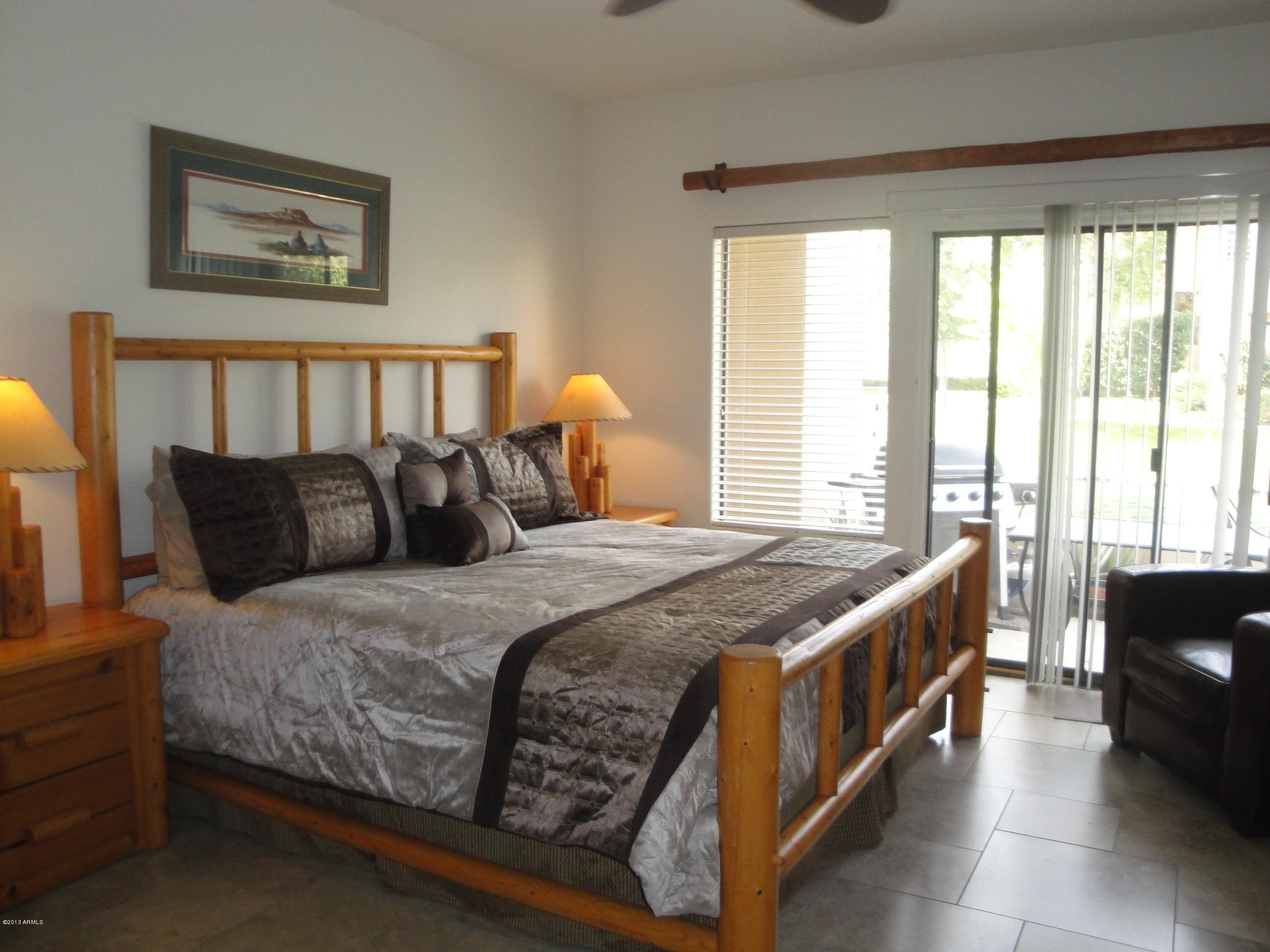 7272 East Gainey Ranch Road, Unit 124 Scottsdale, AZ 85258 - Photo 10 of 36 DOWNSTAIRS MASTER BEDROOM