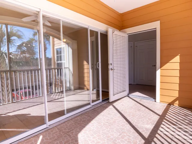 a view of a balcony with door