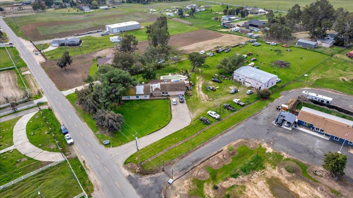 16860 Mark Road Madera, CA 93636 - Photo 50 of 76 an aerial view of a golf course with parking space