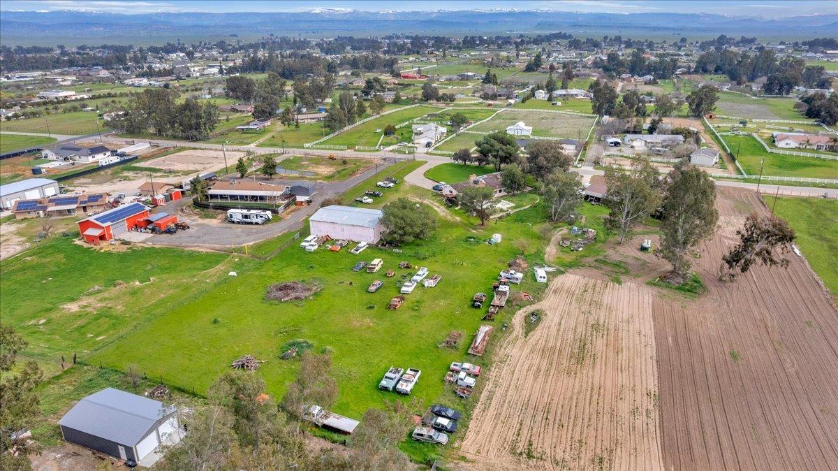16860 Mark Road Madera, CA 93636 - Photo 55 of 76 an aerial view of residential houses with outdoor space