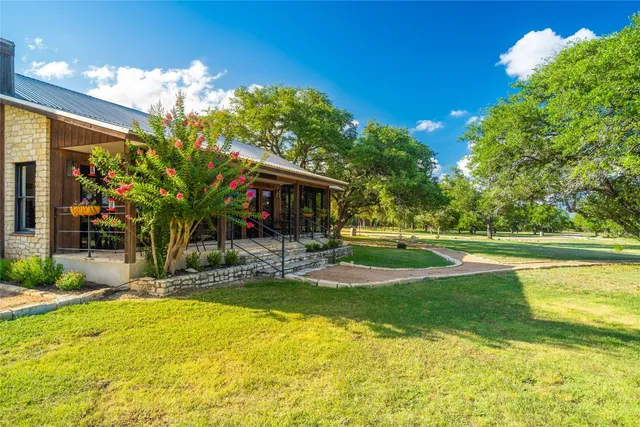 a view of a house with swimming pool