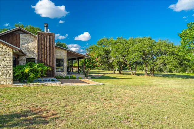 a view of a house with a swimming pool