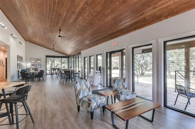 a livingroom with furniture and wooden floor