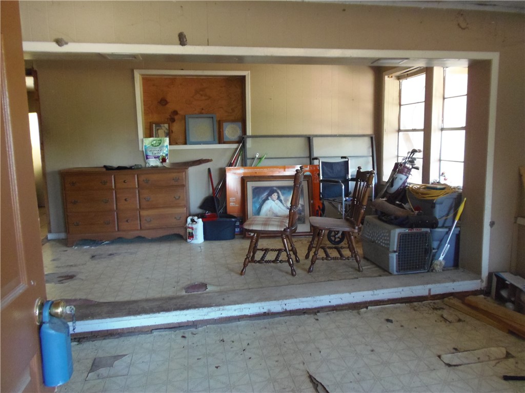 916 Marriott Drive Portland, TX 78374 - Photo 17 of 24 a living room with furniture a window and a table