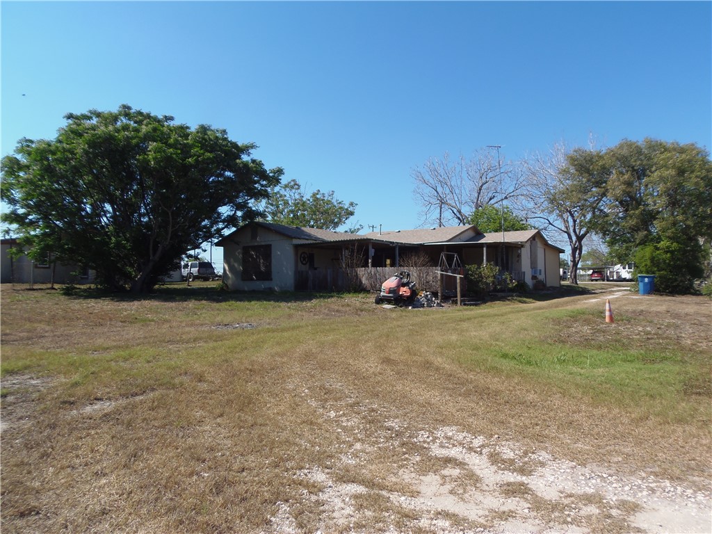 916 Marriott Drive Portland, TX 78374 - Photo 21 of 24 a front view of a house with a yard and garage