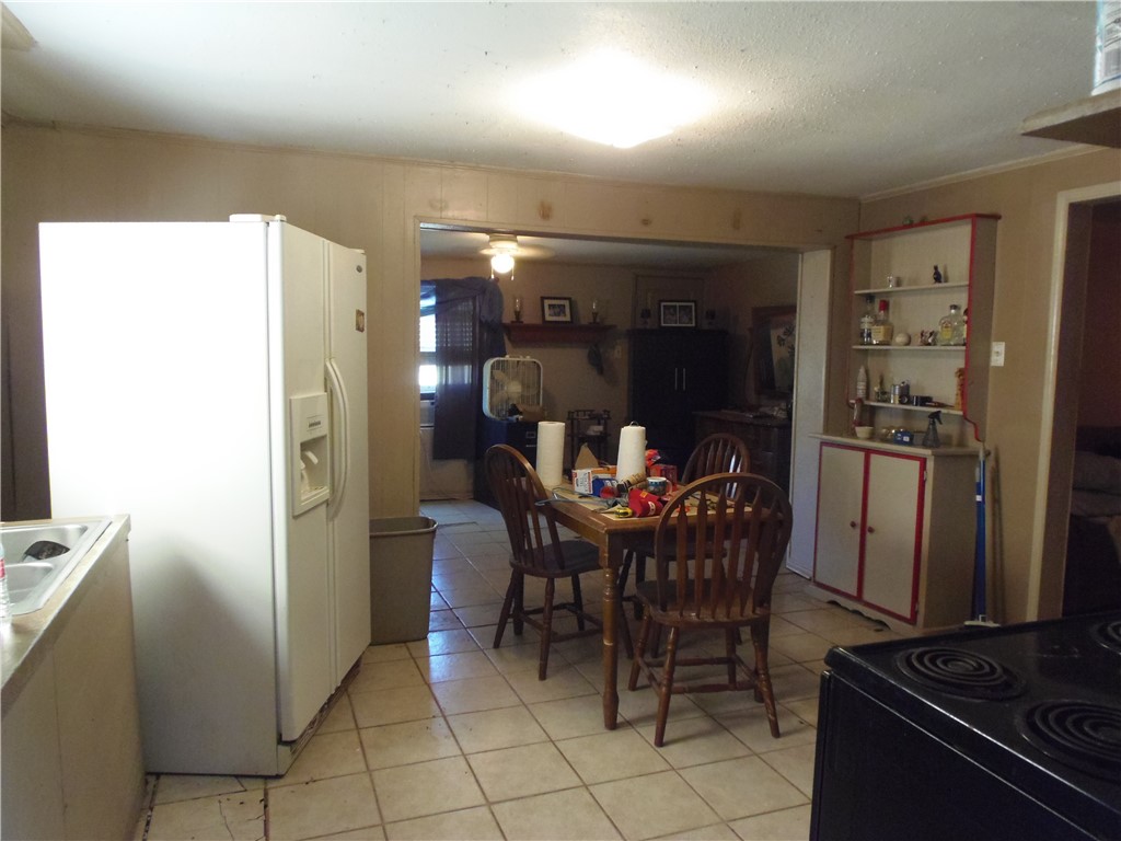 916 Marriott Drive Portland, TX 78374 - Photo 4 of 24 a dining room with furniture and chandelier