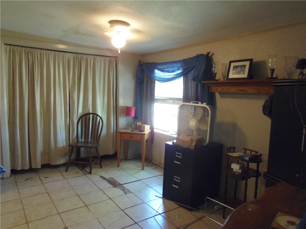 916 Marriott Drive Portland, TX 78374 - Photo 6 of 24 a room with furniture and window