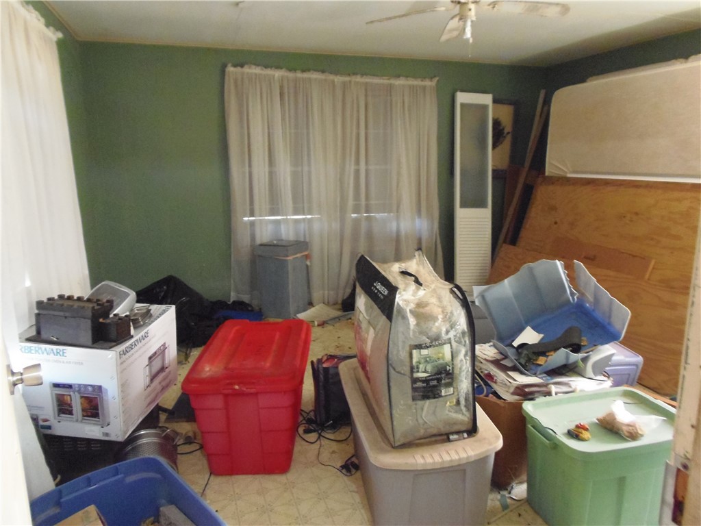 916 Marriott Drive Portland, TX 78374 - Photo 9 of 24 a living room with furniture and a fireplace