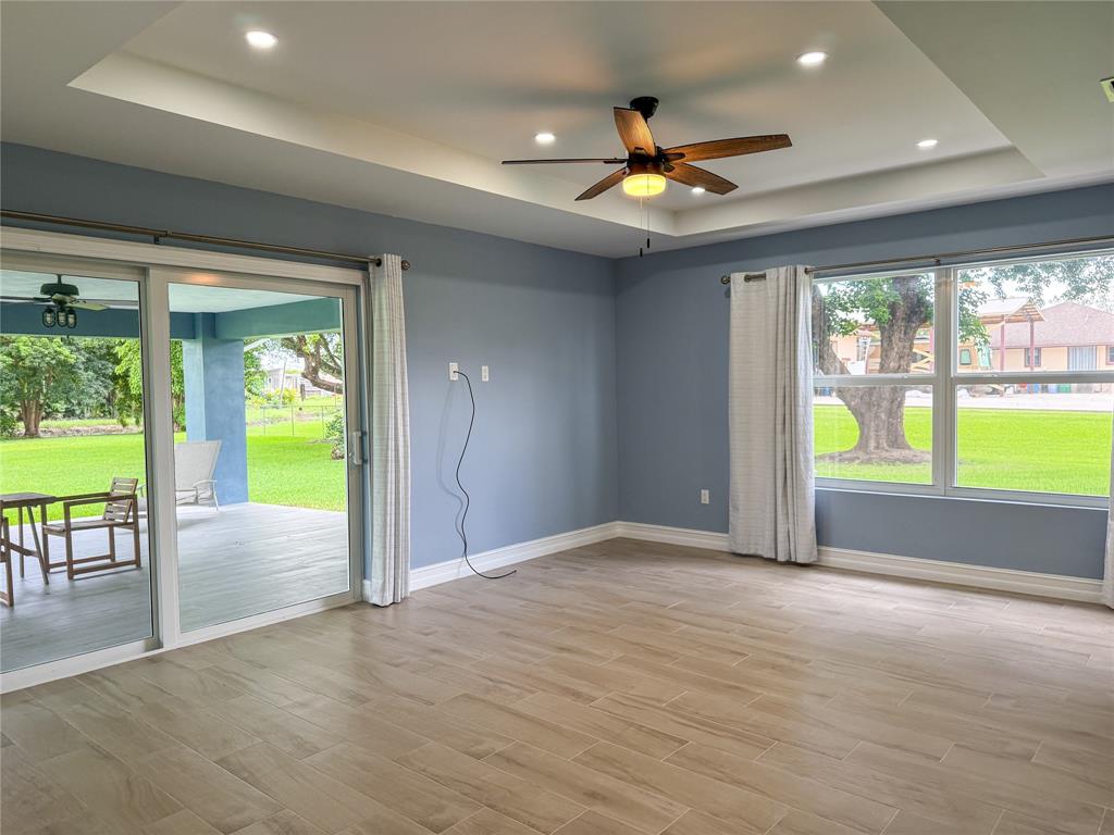 17420 Southwest 54th Street Southwest Ranches, FL 33331 - Photo 17 of 34 a view of an empty room with a window and outside view
