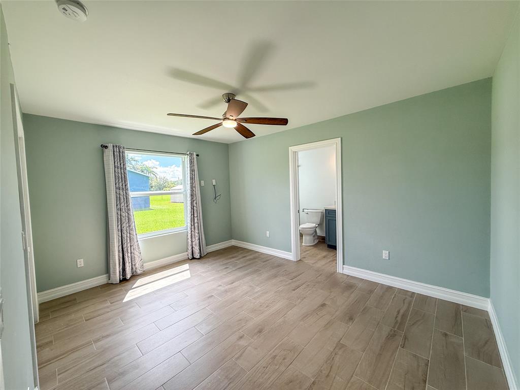 17420 Southwest 54th Street Southwest Ranches, FL 33331 - Photo 21 of 34 wooden floor in an empty room