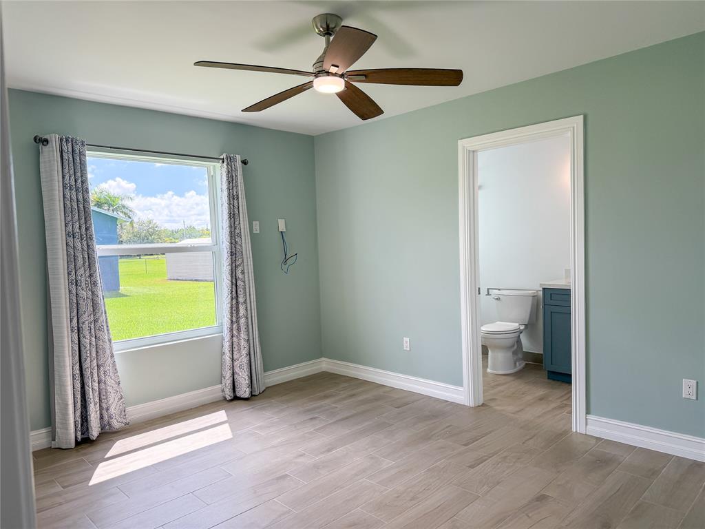 17420 Southwest 54th Street Southwest Ranches, FL 33331 - Photo 22 of 34 a view of an empty room with a window
