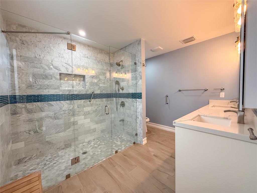 17420 Southwest 54th Street Southwest Ranches, FL 33331 - Photo 22 of 40 a bathroom with a sink mirror and shower