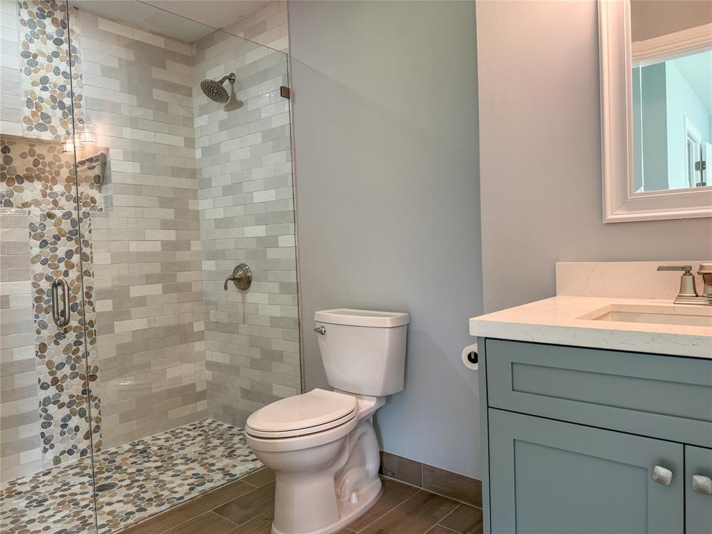 17420 Southwest 54th Street Southwest Ranches, FL 33331 - Photo 32 of 34 a bathroom with a sink a toilet and shower
