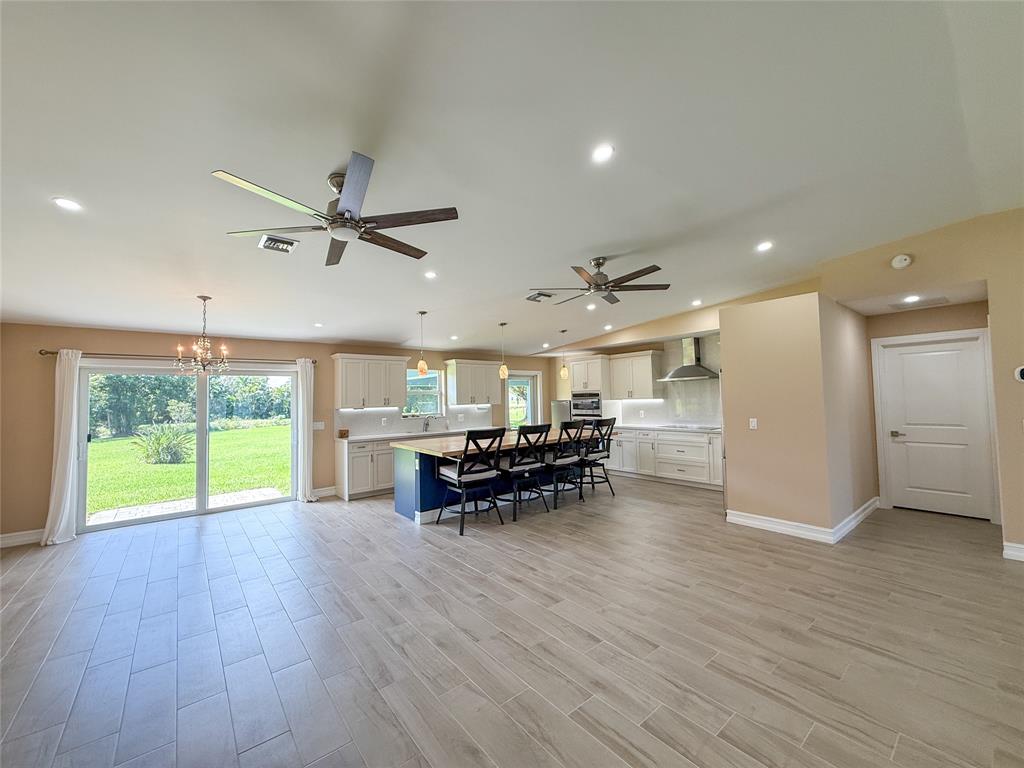 17420 Southwest 54th Street Southwest Ranches, FL 33331 - Photo 8 of 34 a view of a kitchen and dining room